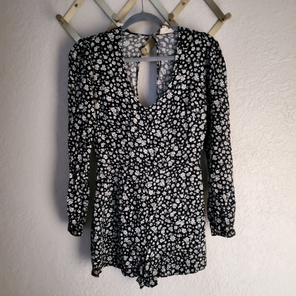 Black + White Romper with open back detail. LA Heart Size L